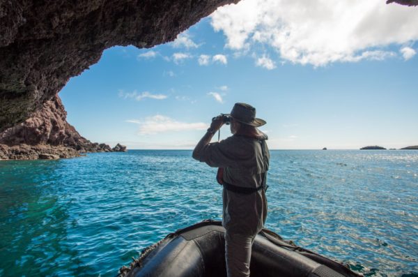 Guest viewing rock formations in the Galapagos Islands.
